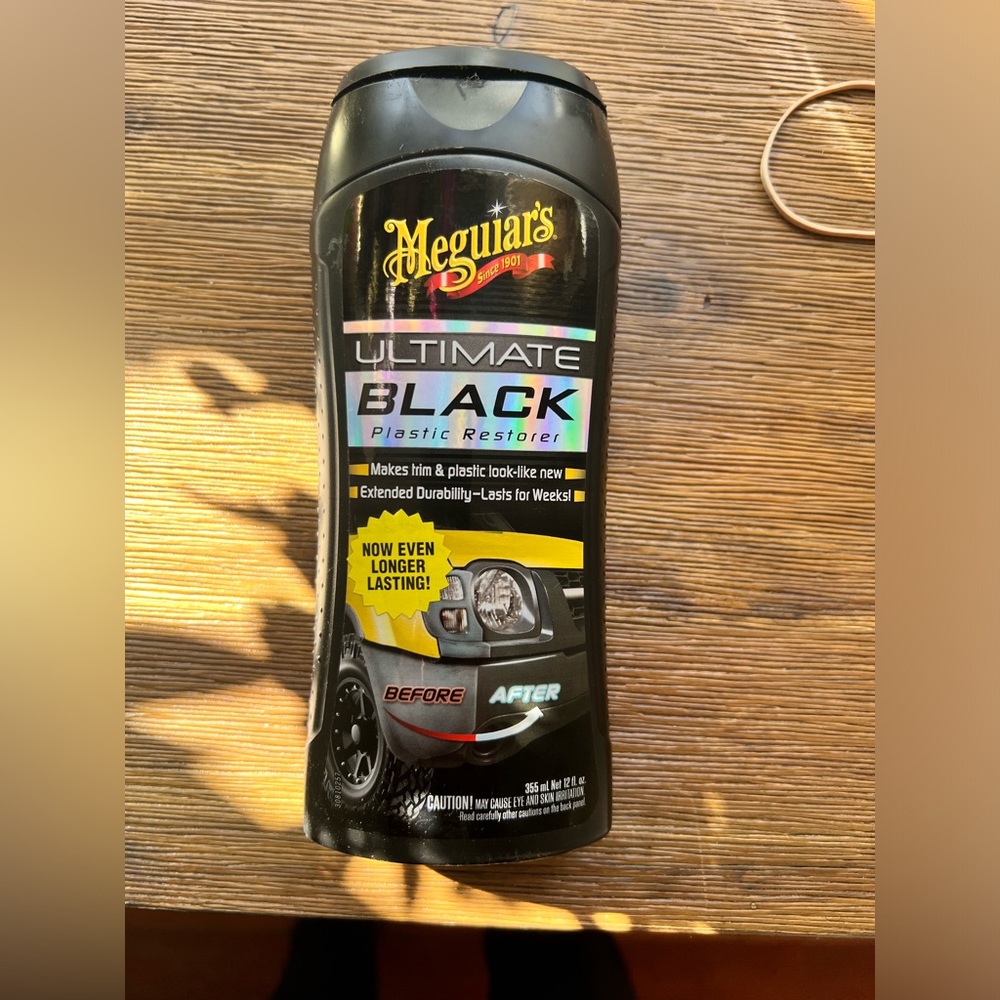 Black car trim paint.